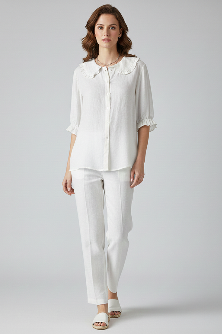 Soft neutral white blouse with buttoned center front