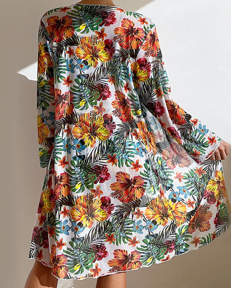 Women’s skirted bikini set with soft floral details and graceful silhouette, back angle view of the cover up