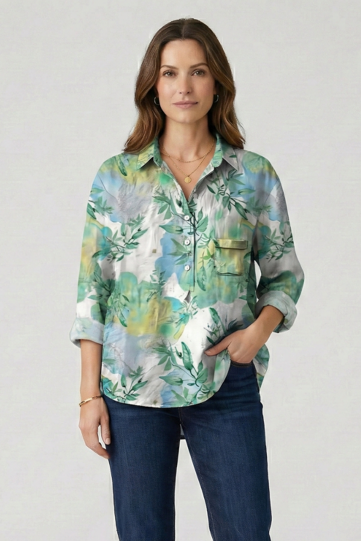 Model in collared floral top full button closure detail
