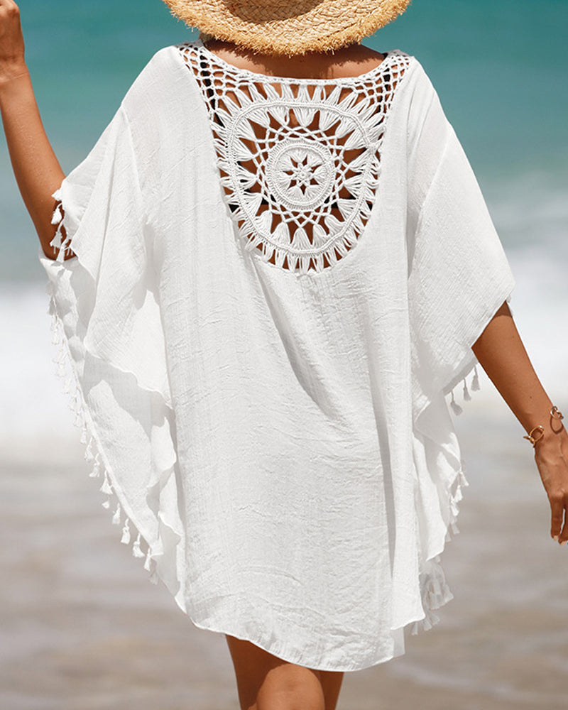 Flowy boho beach cover-up styled for effortless summer layering.