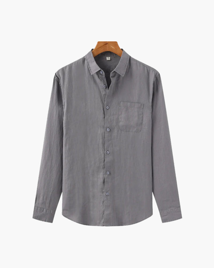 A casual long sleeve shirt on a plain background.