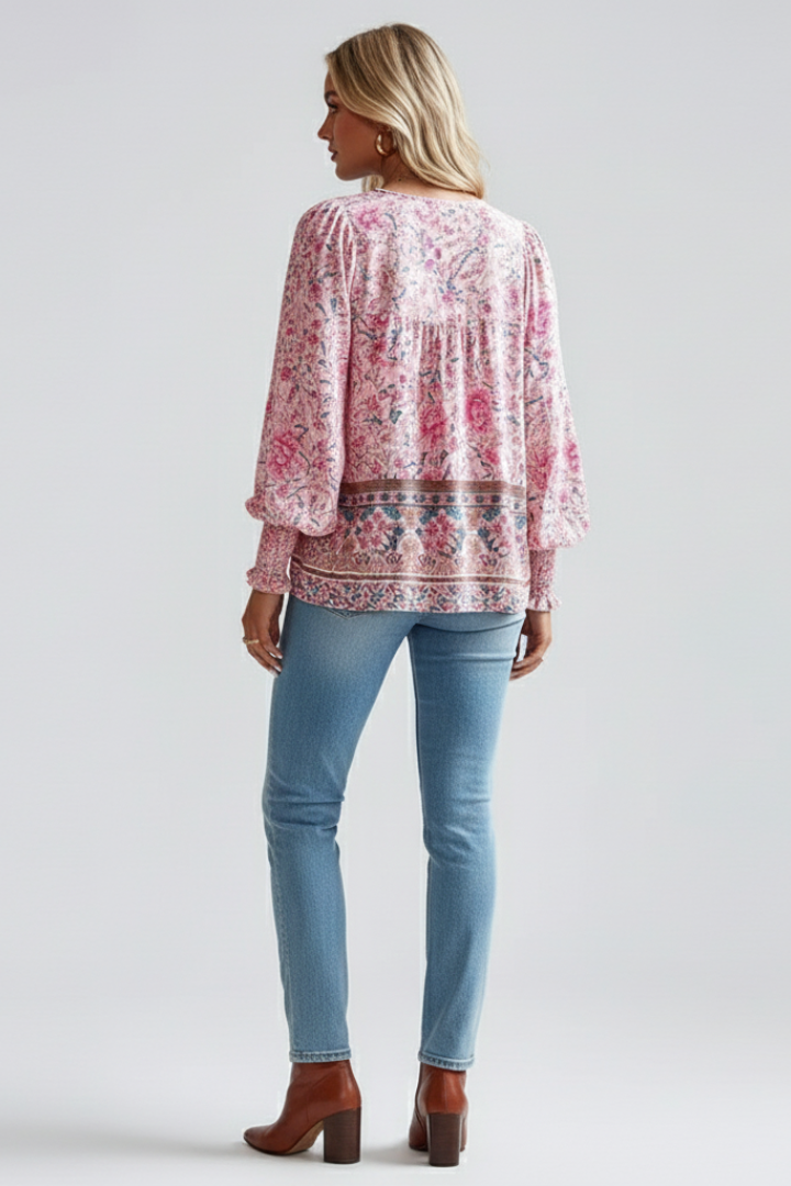 Casual outfit featuring printed top and denim jeans back angle view