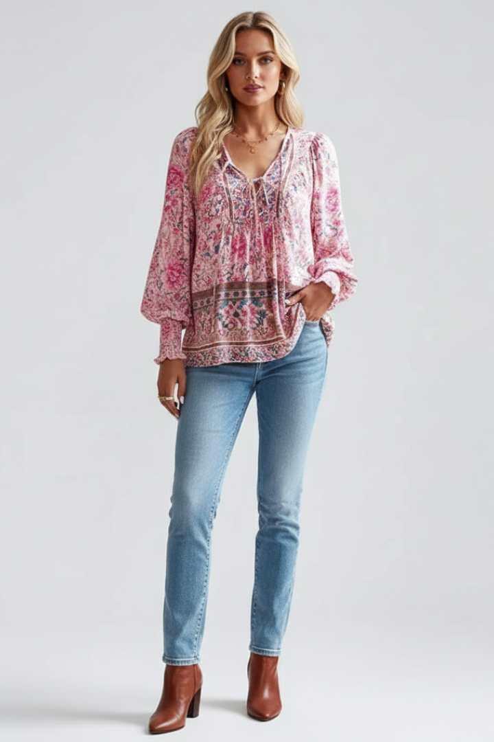 Front view of pink printed top on model