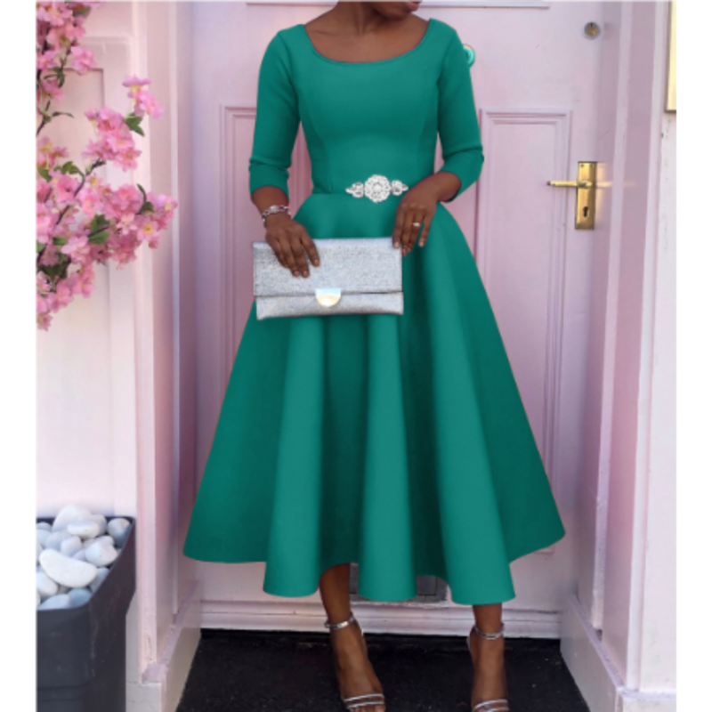 Woman wearing graceful midi dress in full-length front pose photo.