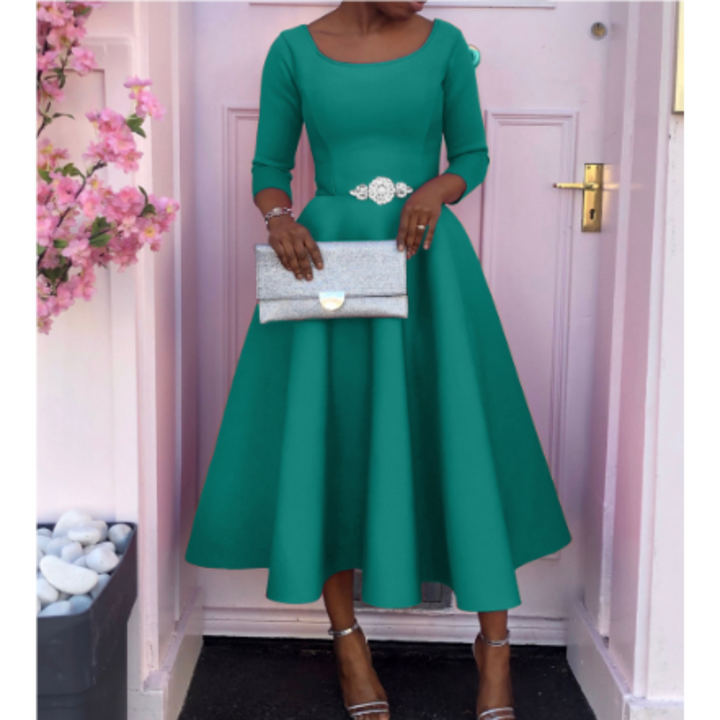 Woman wearing graceful midi dress in full-length front pose photo.