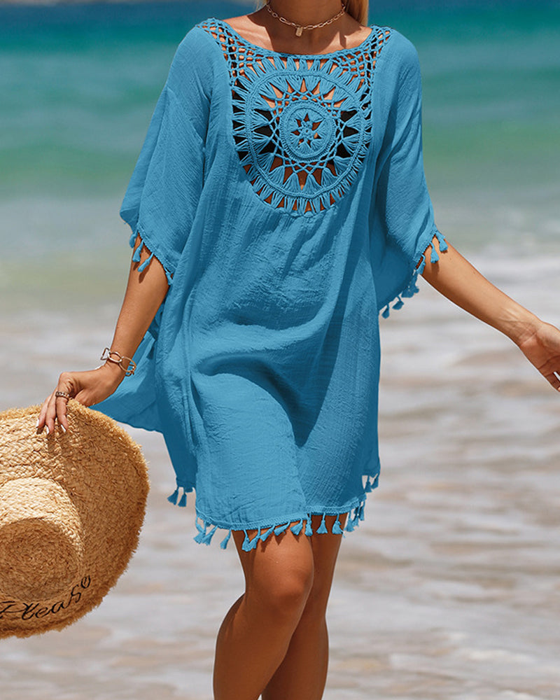 Elegant bohemian swim cover-up perfect for beachside styling.