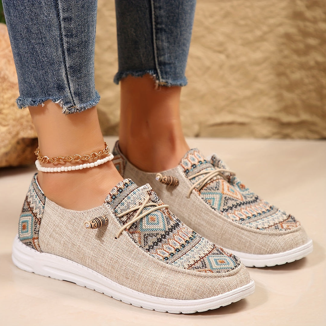 On-foot sneakers with tribal print and white soles