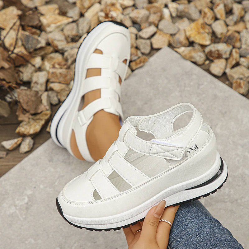 Casual white sneakers styled with cropped jeans