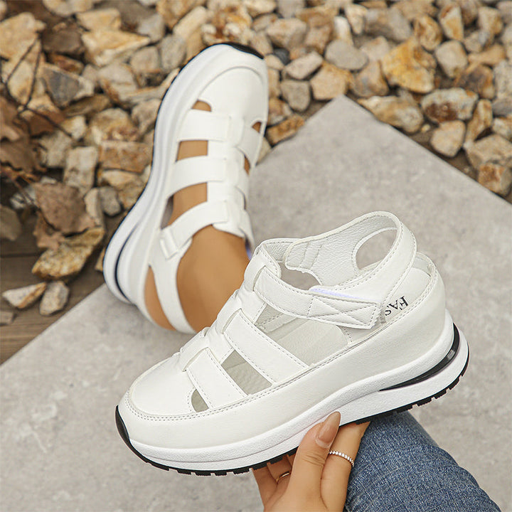Casual white sneakers styled with cropped jeans