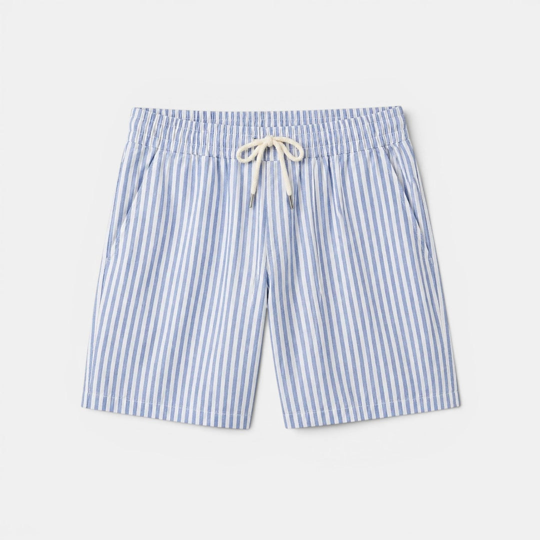  Male model presenting striped casual shorts with a plain background.