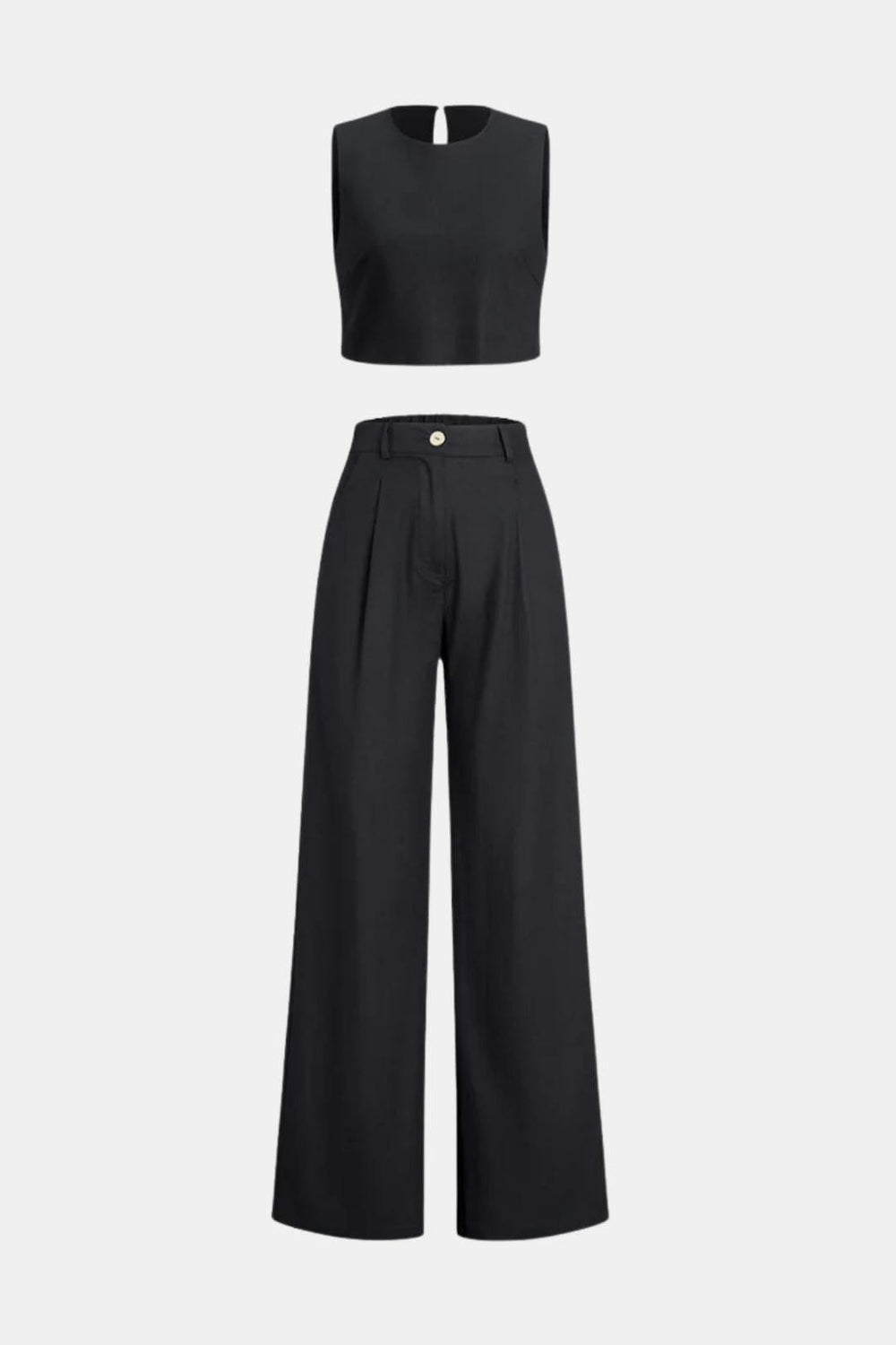 Relaxed two-piece outfit with flowy trousers against a plain background.