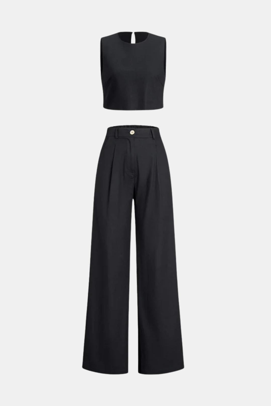 Relaxed two-piece outfit with flowy trousers against a plain background.