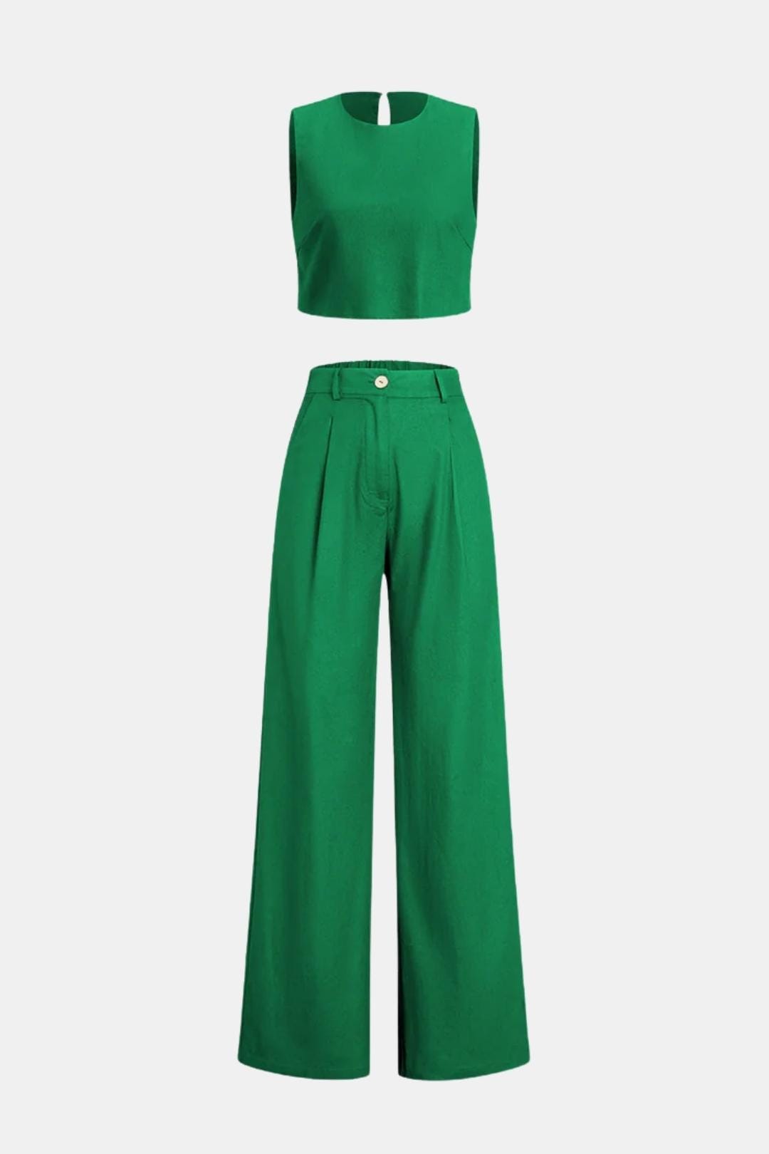 Modern cropped top and loose pants on a plain background.