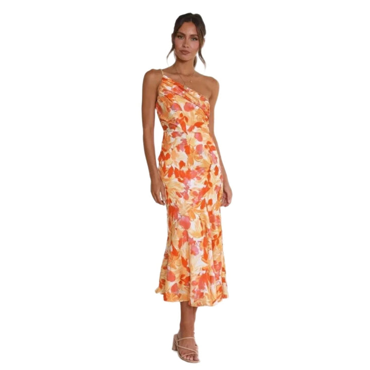 Model showing elegant floral styling with visible feet against a plain setting.