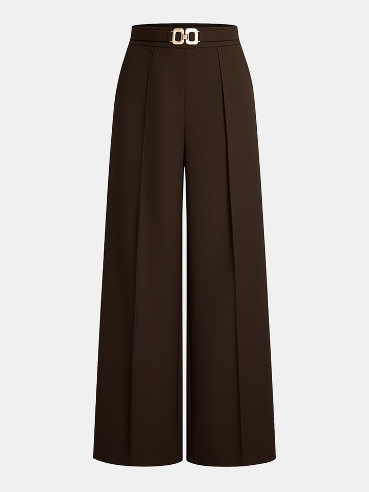 High waist pants with a clean plain background.