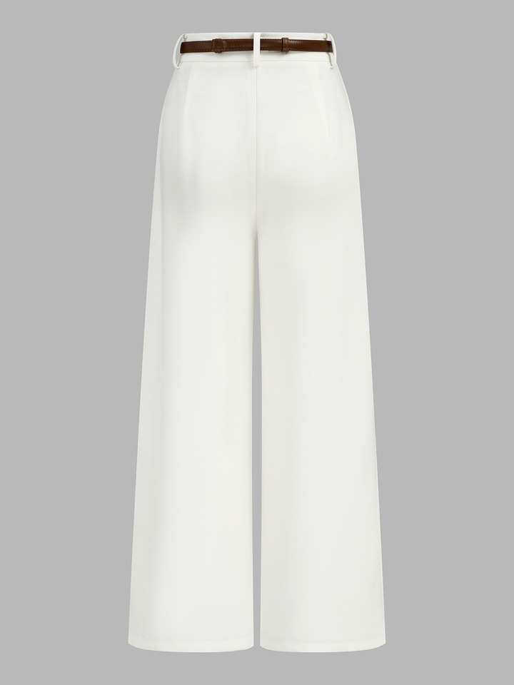 Waist belted long pants against a plain background.