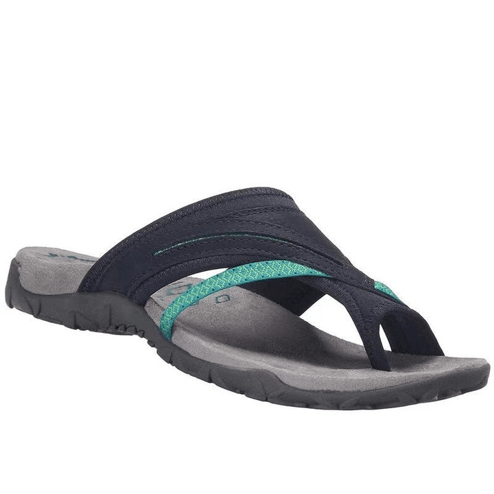 Minimalist sandal design worn by foot model white background