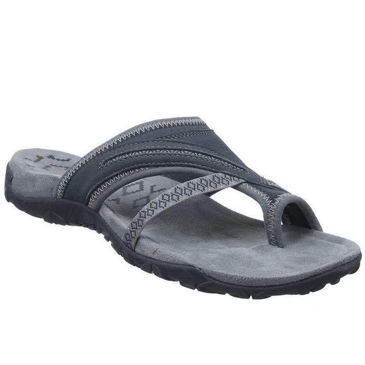 Top view sporty sandals on foot model plain white background