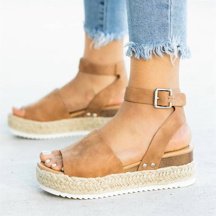 Side view foot model showing elevated wedge heel design