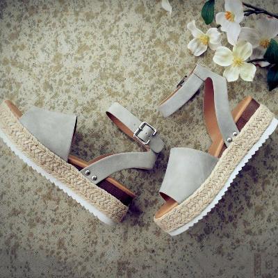 Angled top foot highlighting sandal silhouette and structure clearly