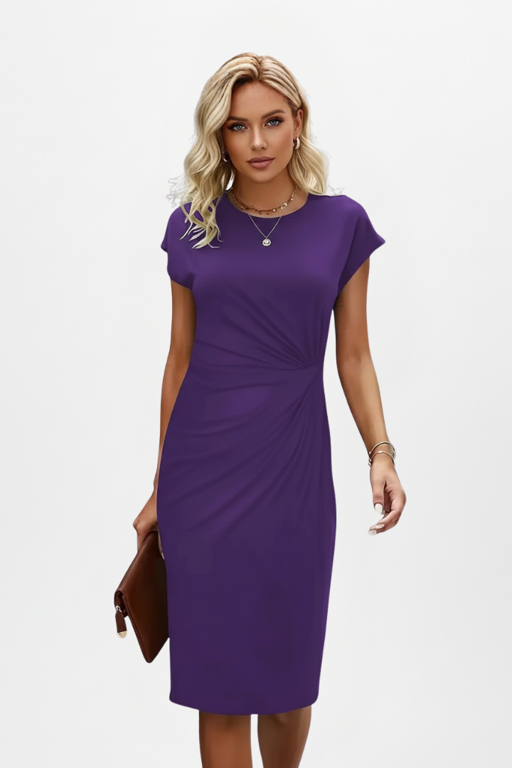 Female model showcasing slim silhouette purple dress, front view