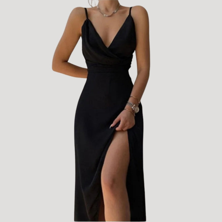 Model front pose highlighting elegant slit style plain background