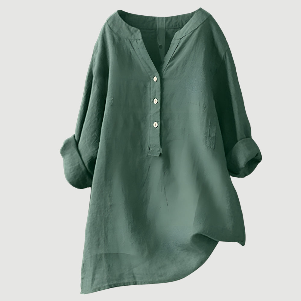 Breathable linen blouse displayed on a plain background for everyday styling.