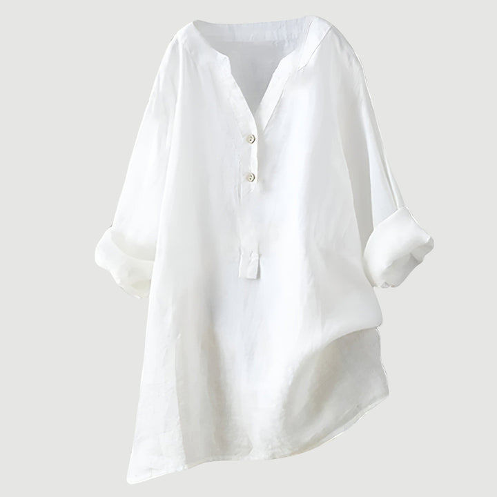 Lightweight linen top for women presented against a plain background.
