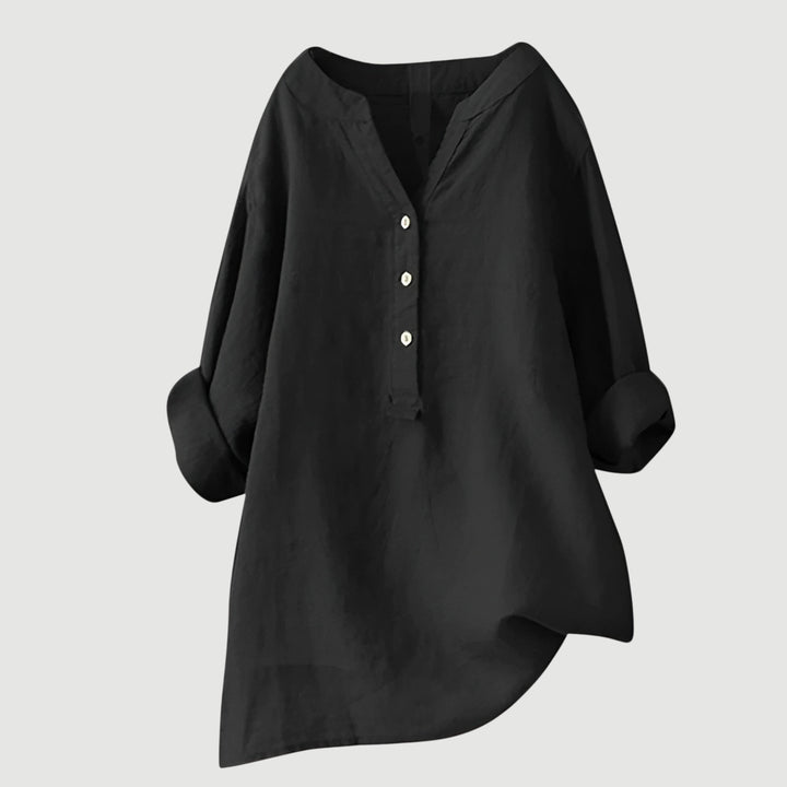 Lightweight women’s top made from breathable linen on plain background.