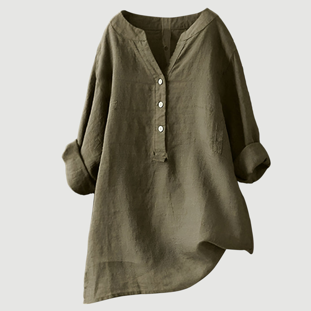 Relaxed fit linen top ideal for casual outfits on a plain background.