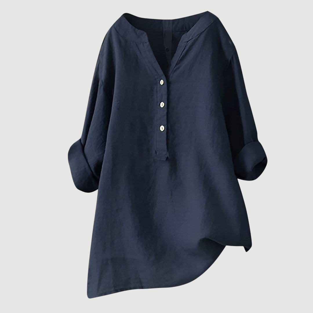 Women’s relaxed fit linen shirt shown on a plain background.