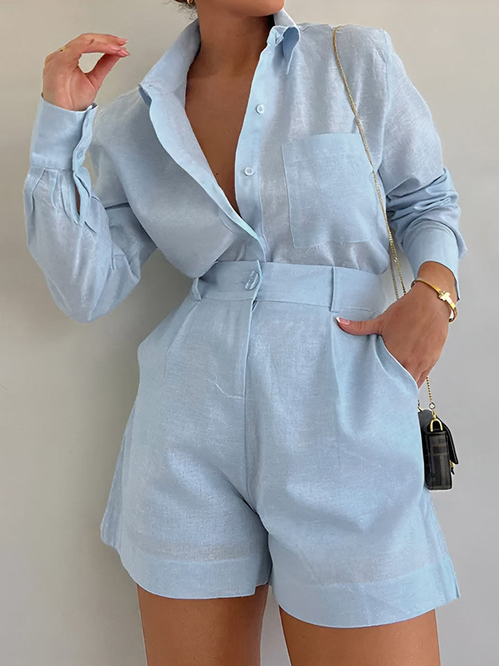 Woman wearing a long sleeve co-ord set against a plain background.