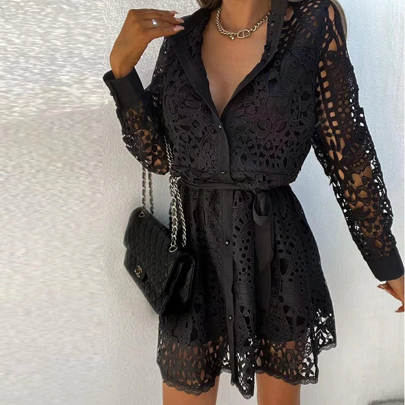  Woman in a stylish lace dress featuring a V-neck 