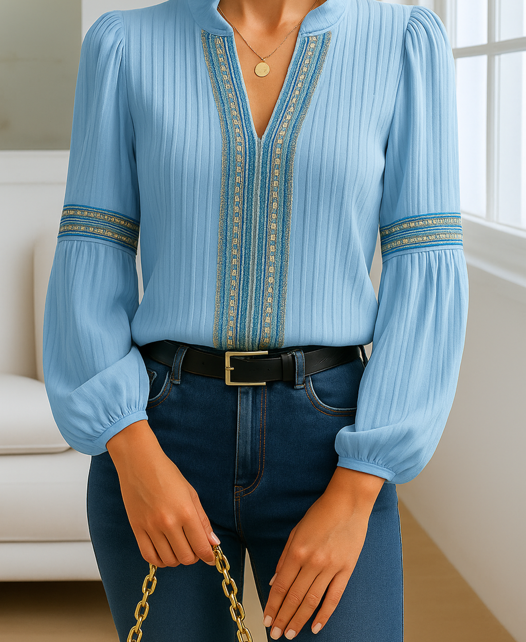 Model in a classic cotton blend blouse against a plain background.