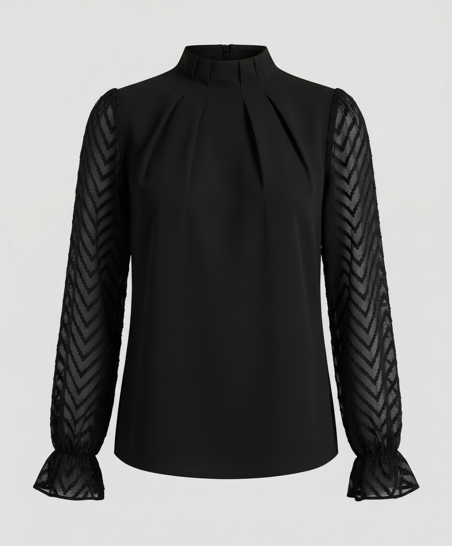 Woman wearing a long sleeve fashion top with a refined silhouette against a plain backdrop.