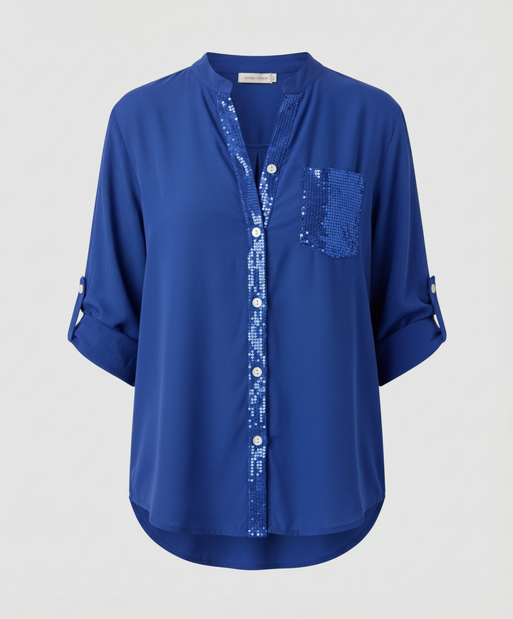 Casual blouse featuring rollable sleeves and a sequin chest pocket.
