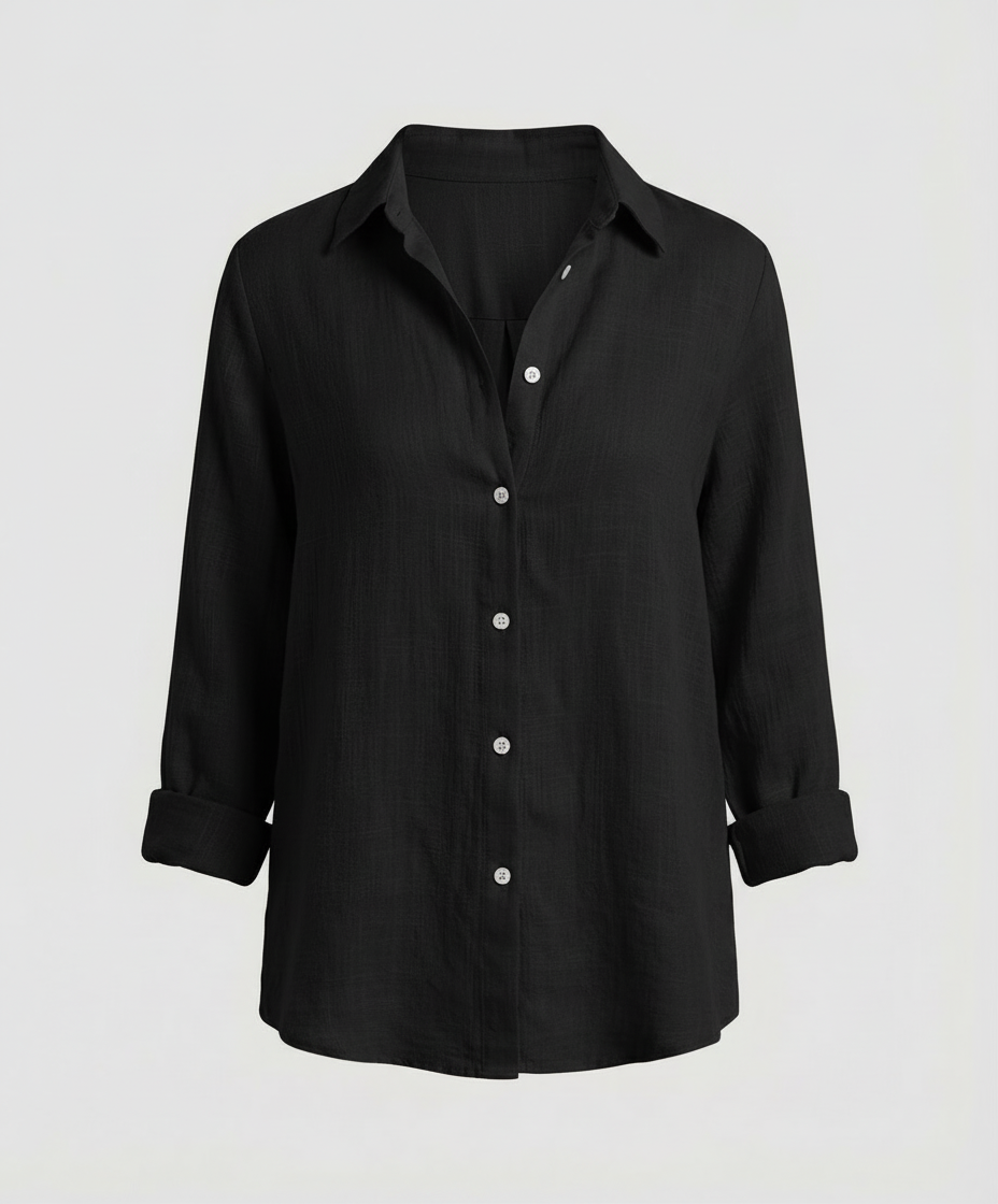 Woman showcasing a comfortable long-sleeve blouse with a refined appearance.
