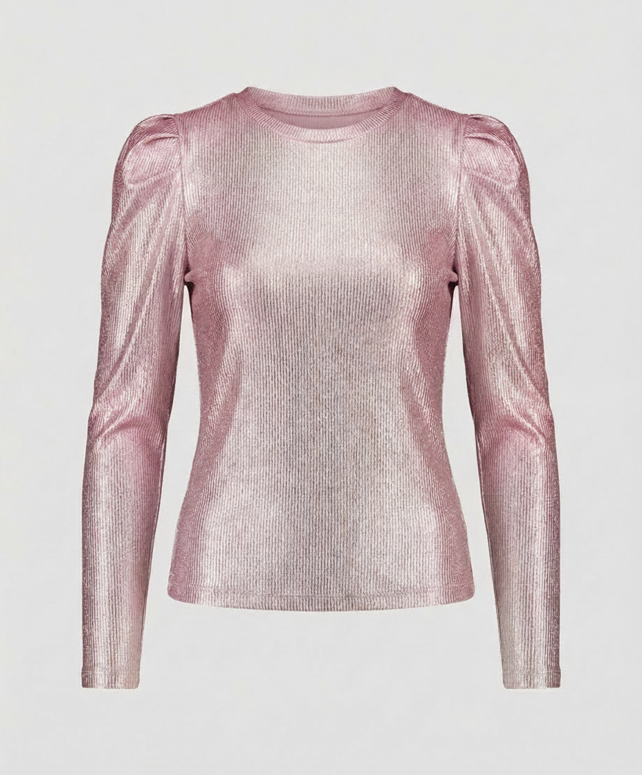Female model showcasing a glittering blouse with voluminous sleeves and round neckline.

