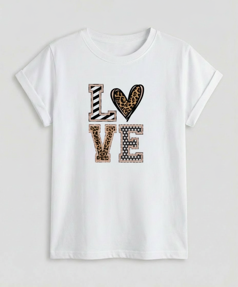 Woman wearing a casual short sleeve top with a comfortable loose silhouette.