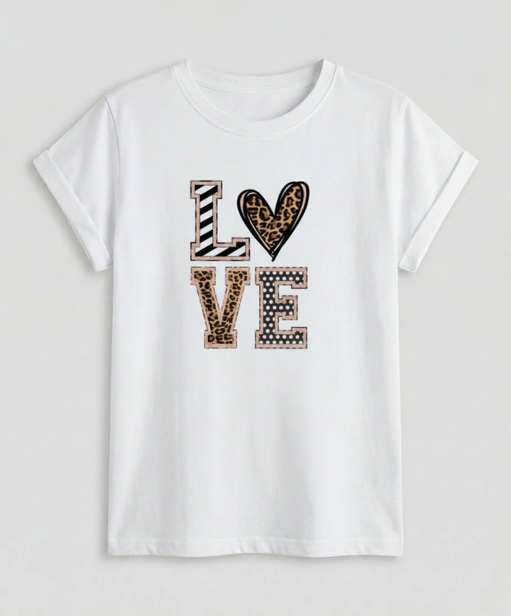 Woman wearing a casual short sleeve top with a comfortable loose silhouette.