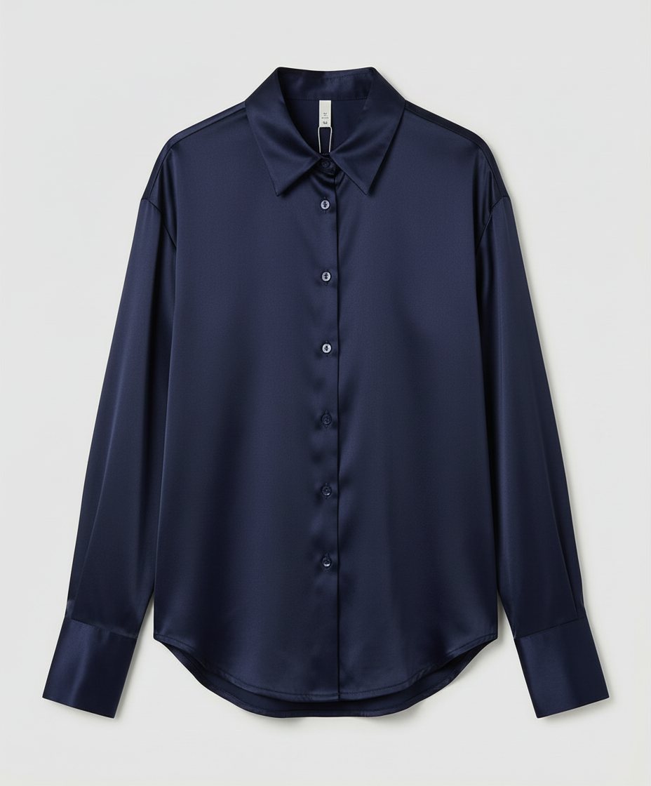 Cassic blouse for dressy outfits on a plain background.
