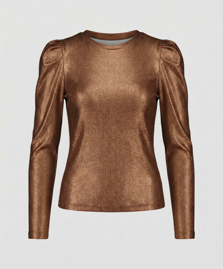 Woman wearing a fitted sparkling top with a classic round neckline on a plain backdrop