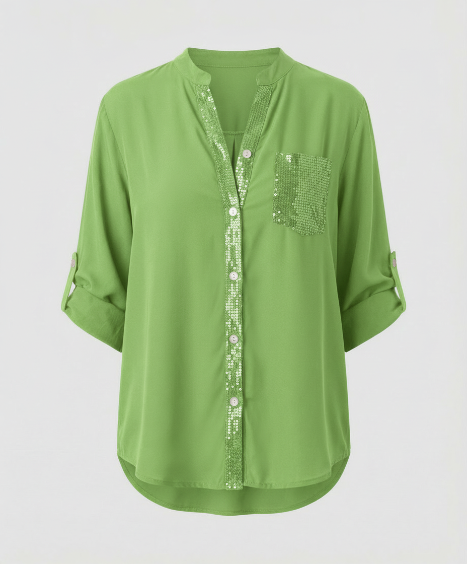Relaxed-fit blouse with a shimmering chest pocket.