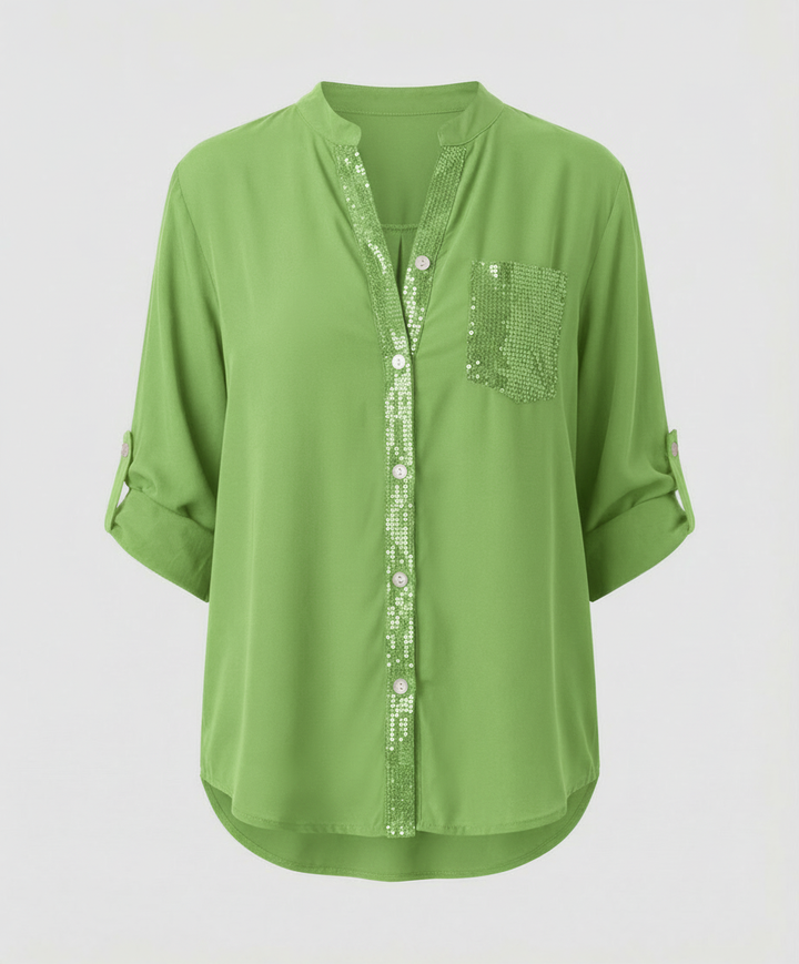 Relaxed-fit blouse with a shimmering chest pocket.