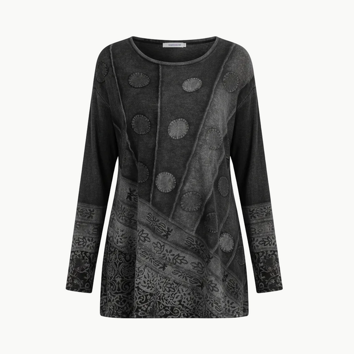 Woman in a relaxed-fit patterned tunic suitable for daily wear and outings.
