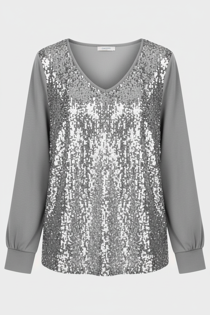 Woman wearing an elegant shimmer blouse suitable