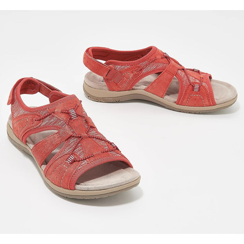 Front close sandals on feet plain background showing toe area