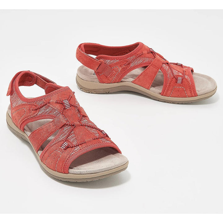 Front close sandals on feet plain background showing toe area