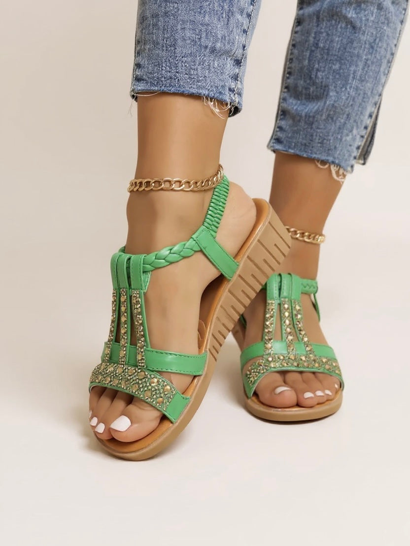 Comfortable wedge heel sandals worn by a model with a clean background.