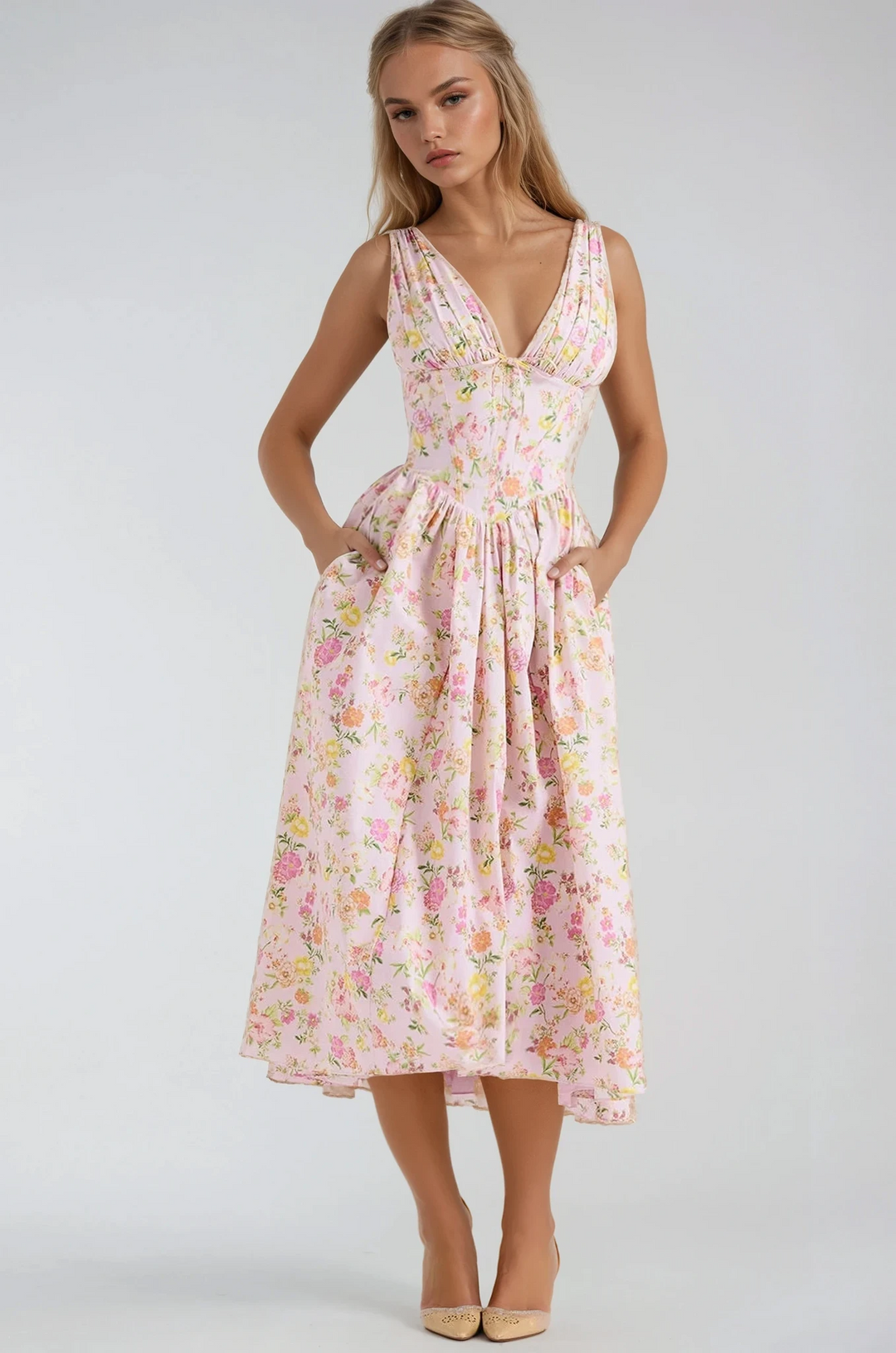 Elegant summer dress with a relaxed silhouette on a plain background.